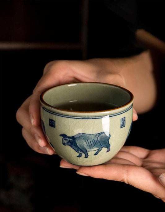 Hand-Painted Blue and White Porcelain Teacup – 'Five Cattle' Motif with Crackle Glaze