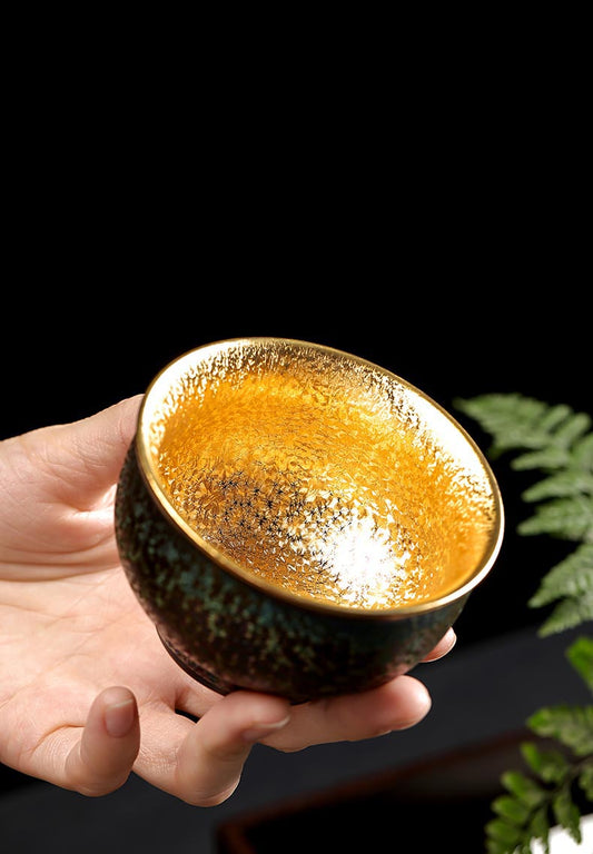 Peacock Luster Gilded Teacup - Majestic Ceramic Artistry from Dehua