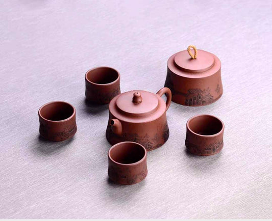 Yixing Zisha Tea Set – Hand-Engraved Jiangnan Motif
